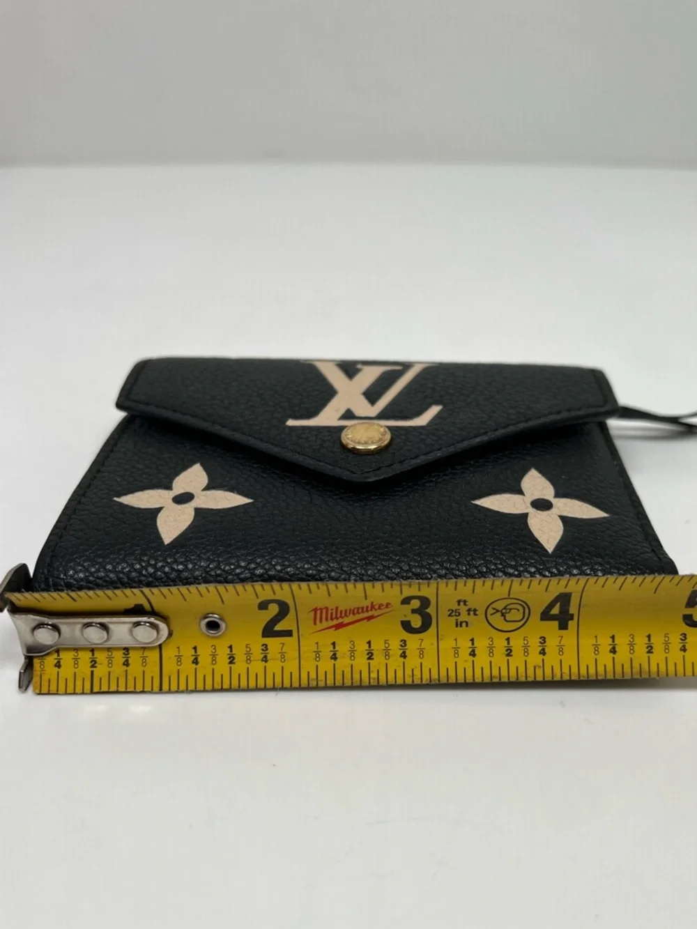 LOUIS VUITTON Portefeuille Victorine Monogram Bicolor Empreinte